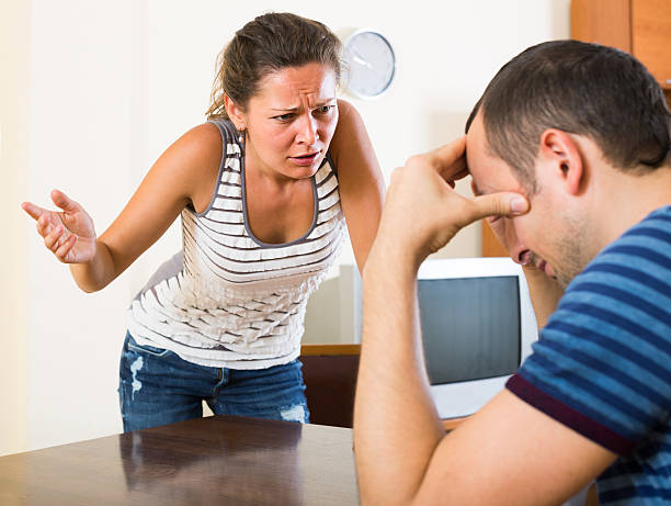 istock family couple shouting while arguing indoors 543991836