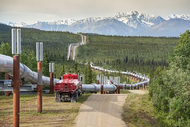 Scenic Trans Alaska Pipline Close Up with Maintenance Truck