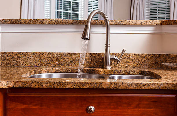 istock Kitchen Water Faucet with Running Water 543992774