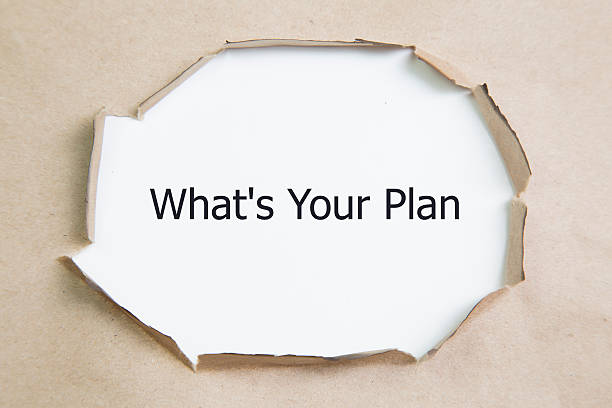 istock The text What's Your Plan appearing behind torn paper 543994156