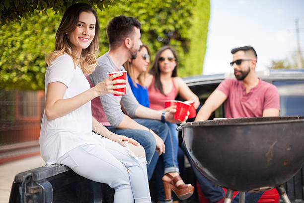 istock Pretty young woman drinking with friends 543995960