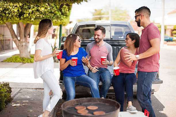 istock Friends talking about football in a barbecue 543996380