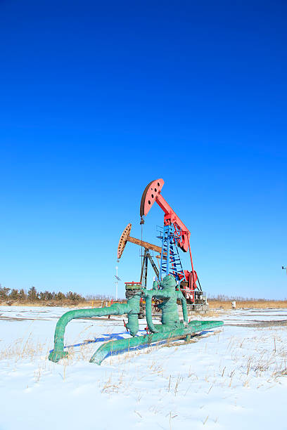 istock Oil field, oil pump in the work 543996730