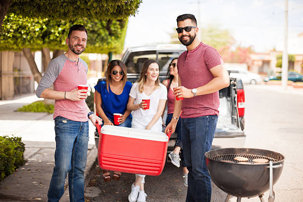istock Friends bringing drinks to a barbecue 543997294