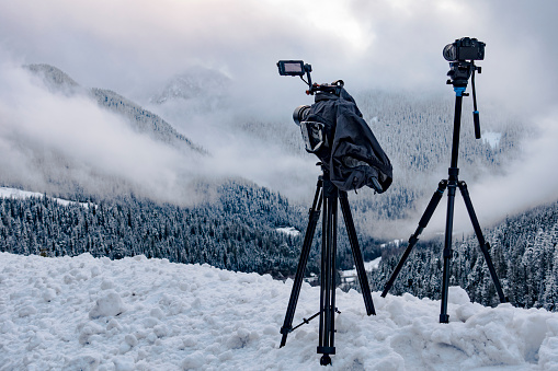 Two Cameras Shooting Timelapses of Mountain Forest Landscape in Nature