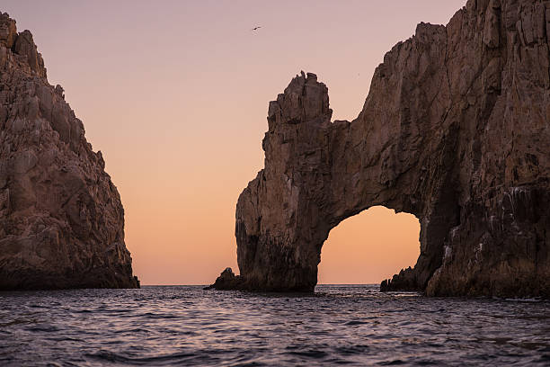 istock Sunset over the Arch in Cabo San Lucas. 543999486