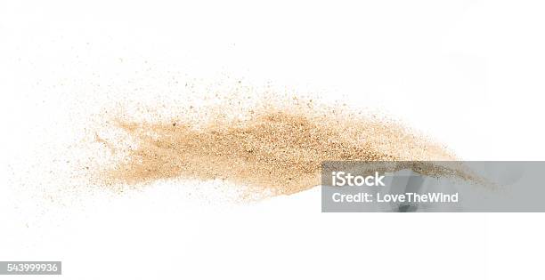 Sand On White Background Stop Motionsand Explode Stock Photo - Download Image Now - Sand, Heap, Wind