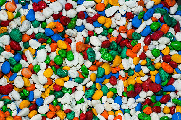 istock Vibrantly colorful pebbles spread is beautiful background. 544001860