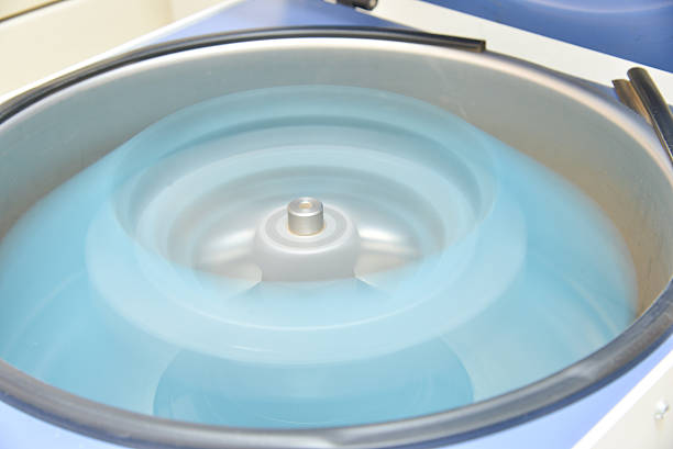 istock Moving blood tubes in the laboratory centrifuge 544002496