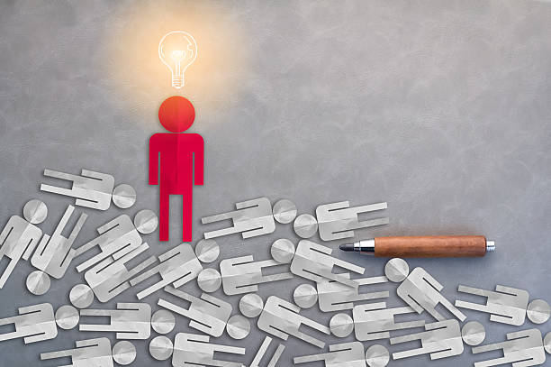 istock red paper man with glow light bulb over head 544095918