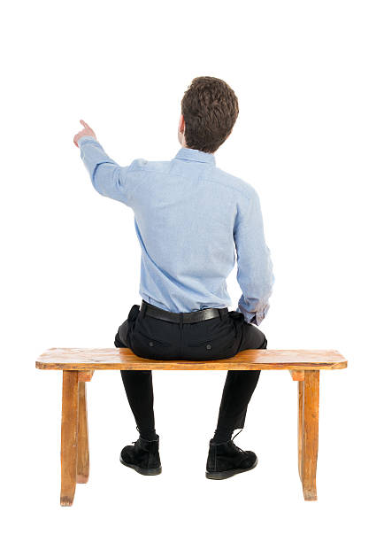 back view of business man sitting on chair and pointing. back view of business man sitting on chair and pointing. businessman watching. Rear view people collection. backside view of person. Isolated over white background. Businessman resting on a wooden bench pics of girls buttocks stock pictures, royalty-free photos & images