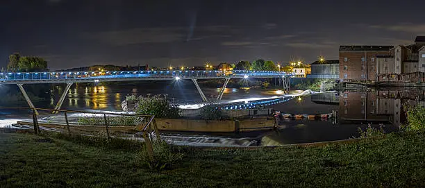 Castleford footbridge at night.Wth the old stoneground flour mill.