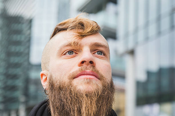 istock Stylish bearded man posing in the street 544101398