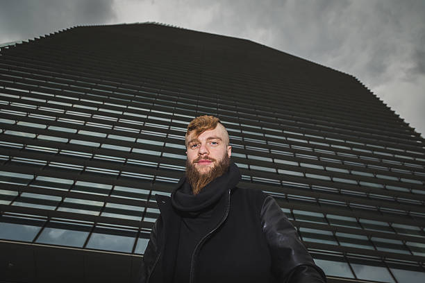 istock Stylish bearded man posing in the street 544101740