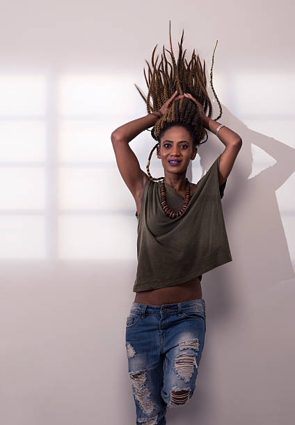 istock African woman with dreadlocks flying upwards. 544102294