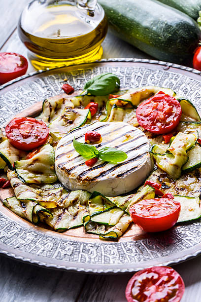 istock Grill Brie camembert cheese zucchini with chili pepper. 544105204