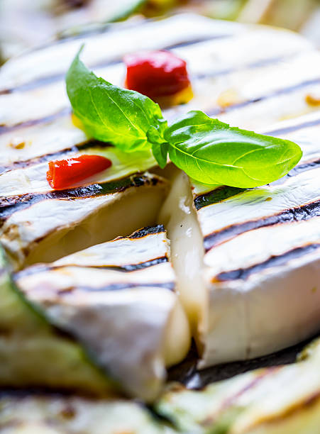 istock Grill Brie camembert cheese zucchini with chili pepper. 544105872