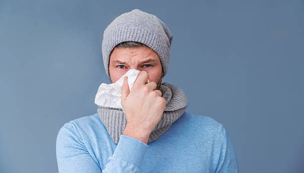 having a cold stock photo