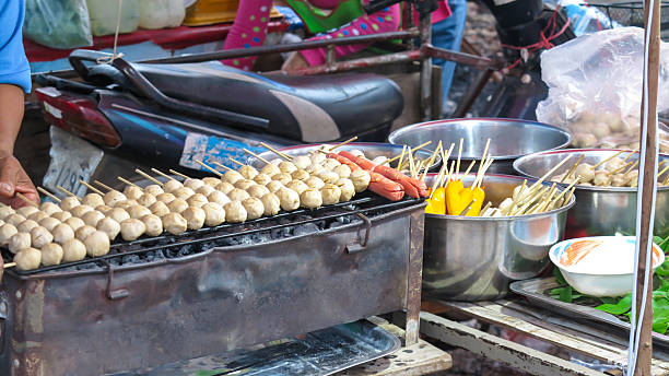 istock Meat balls and sausages on stick. 544109968
