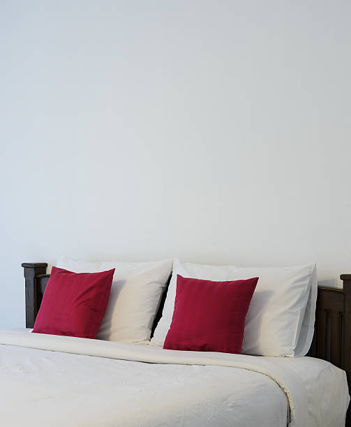 istock White bedroom with tidy white bed 544112530