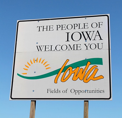 Shenandoah, Iowa, USA-June 28th, 2013: A Welcome sign at the entrance to Iowa welcomes visitors.