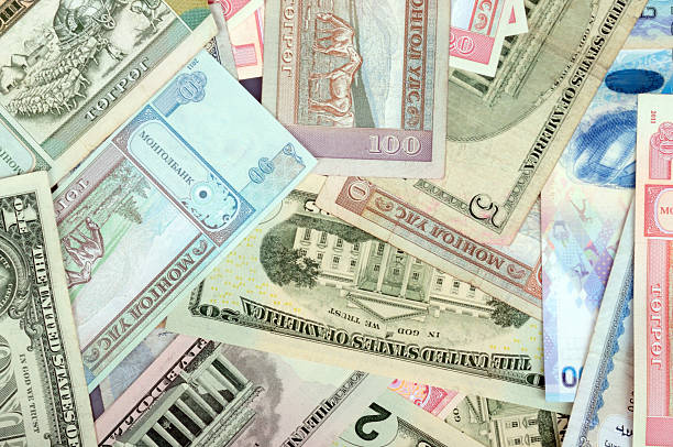 istock background consisting of randomly mixed banknotes from different countries 544118120