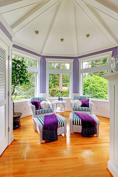 istock Vaulted ceiling living room in purple tones 544119562
