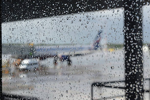 airport in the rain stock photo