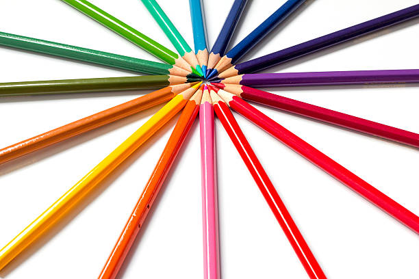 istock Color pencil placed as sun burst on white background 544121692