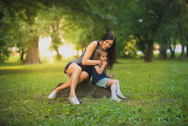 istock Mom and daughter on a stump 544122366