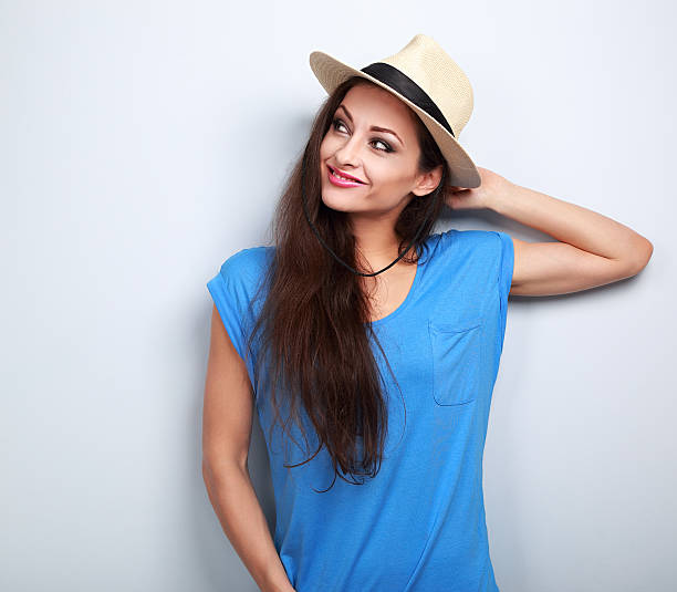 istock Relaxing fun smiling woman in hat thinking about summer holidays 544124052