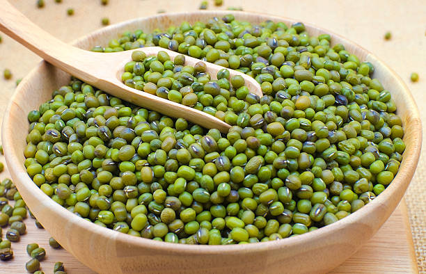 istock mung bean in bowl and sack background. 544125004