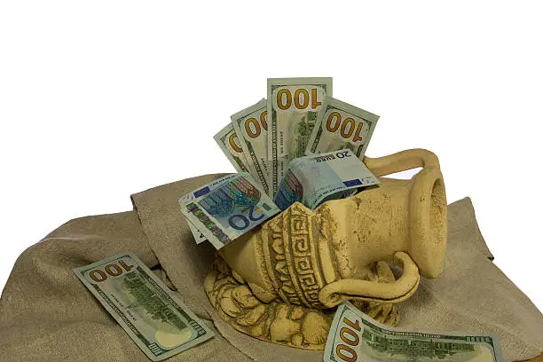 Photo of money in the broken jug