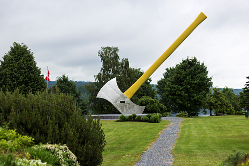 Nackawic, New Brunswick, Canada - June 25, 2014: World's largest axe in Nackawic in Canada. It was commissioned, designed and built in 1991 by a company in Woodstock. There is a time capsule embedded in the head of the axe.