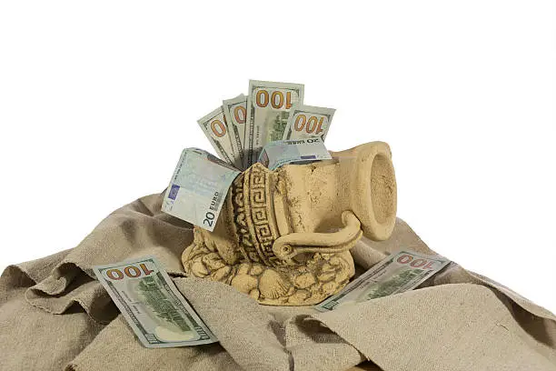 Photo of money in the broken jug