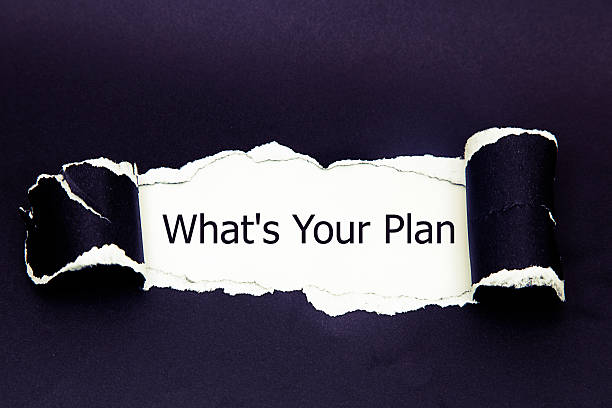 istock The text What's Your Plan appearing behind torn paper 544135024