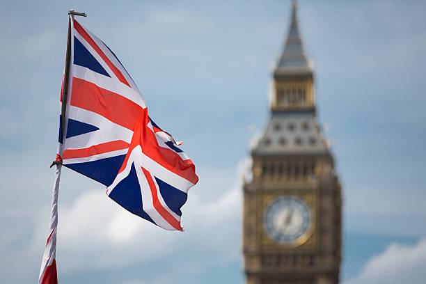 istock Big Ben and a Union Jack flag 544136442