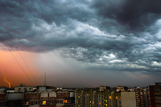 istock Storm clouds, heavy rain. Thunderstorm and lightning over the city. 544137716