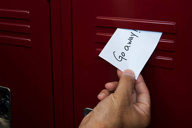 istock Bullying Note Placed in High School Locker 544138194