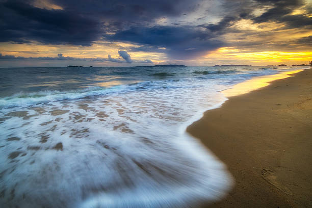 istock Turquoise sea wave at rayong Thailand. On time sunset. 544139650