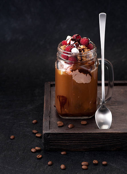 istock Cold coffee with chocolate ice cream and raspberries 544310814