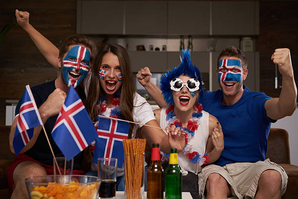 istock cheering iceland soccer fan couples 544311626