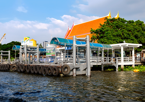 Bangkok, Thailand - December 8, 2015: Route of Chao Phraya Express Boat, approach to the Kiak Kai Pier, Bangkok, Thailand. Chao Phraya Express Boat is a popular method of transporting passengers.