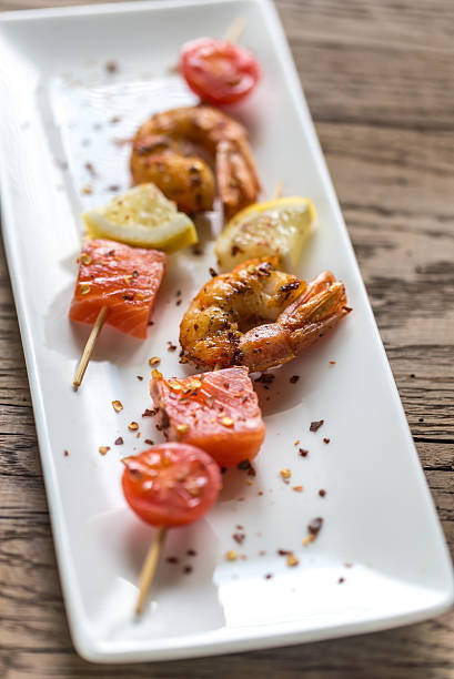 istock Skewers with shrimps and salmon 544312430