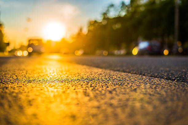 istock Sunny day in a city, view from road 544312522