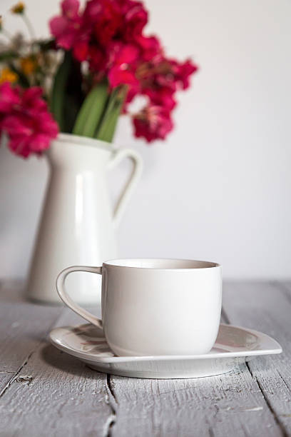 istock Cup of coffee with flowers 544313754