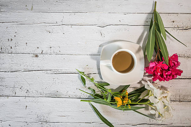 istock Cup of coffee with flowers 544314948