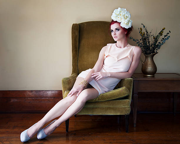 Retro Beautiful Young Woman wearing Vintage Clothing and jewellery