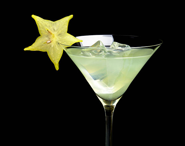 istock Cropped view of cosmo mojito drink on black 544316374
