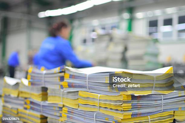 Stuck Of Newspaper Magazine In Print Production Process Stock Photo - Download Image Now
